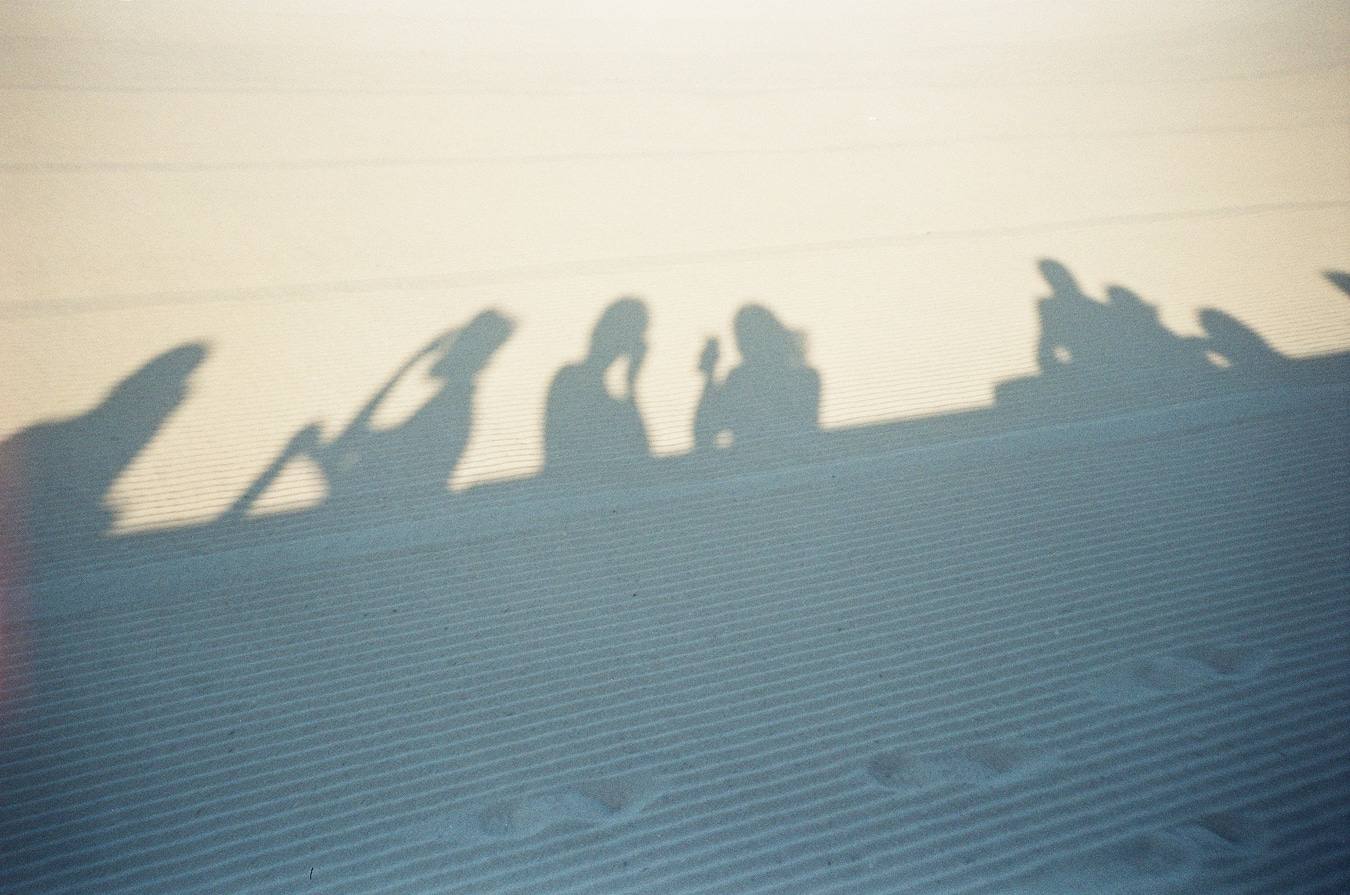 Shadow Silhouettes on Sandy Beach