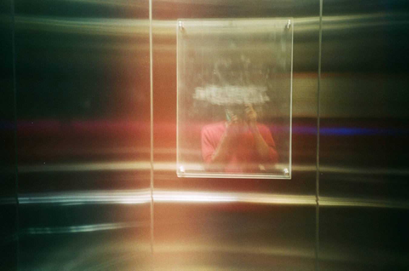 Blurred Reflection in Elevator Mirror
