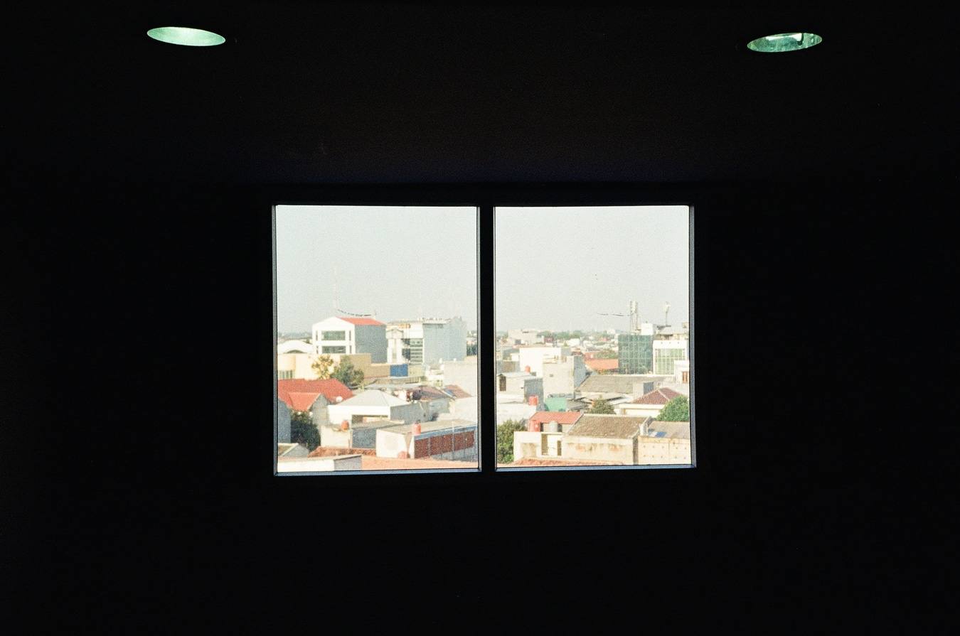 Cityscape Framed Through a Window