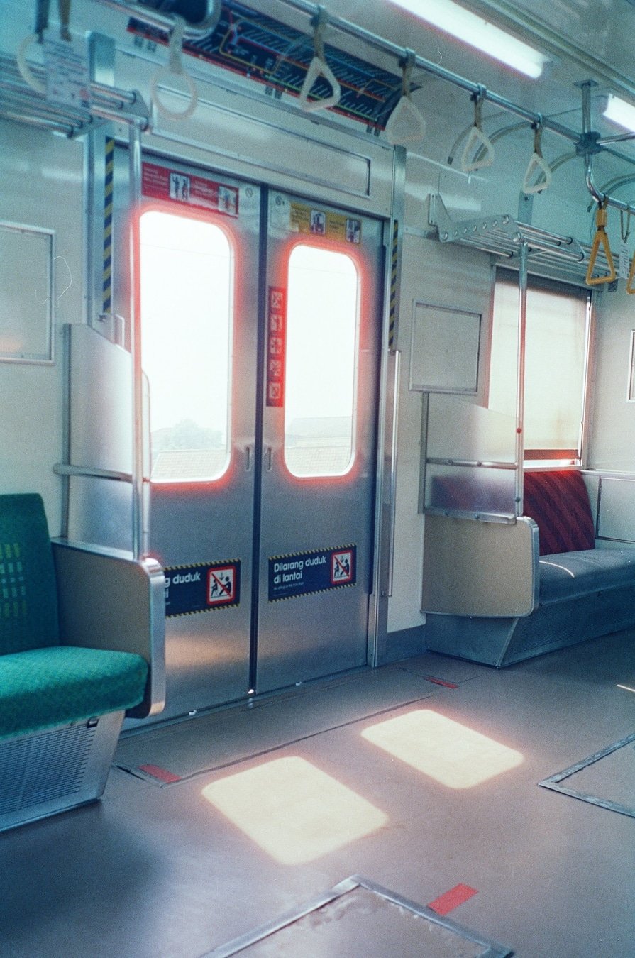 Hoasca 800 sample photo: Empty Train Car with Glowing Doors