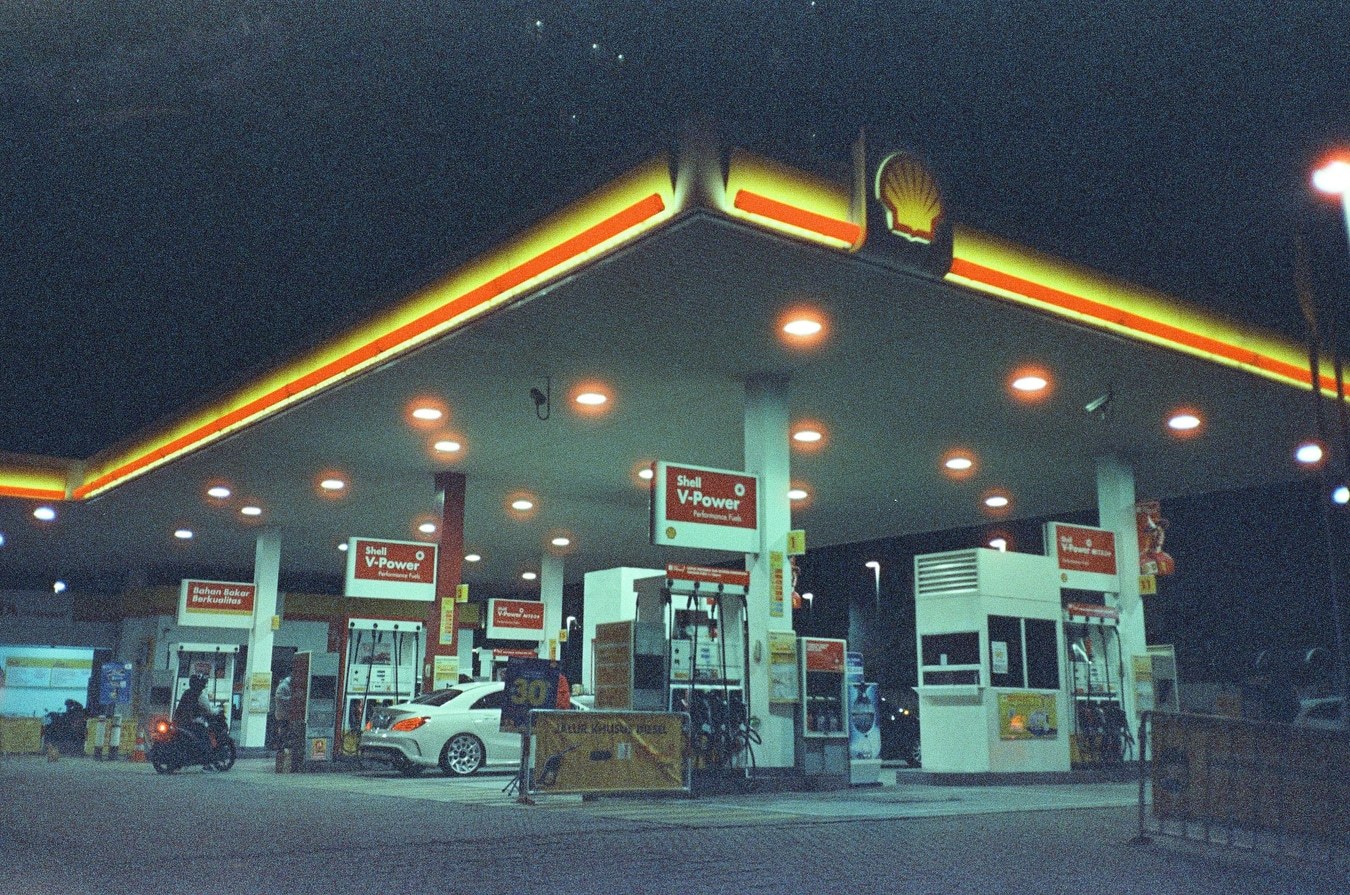 Night Petrol Station Under Starlit Sky. Shot with Olympus Mju II, Cira 800 film