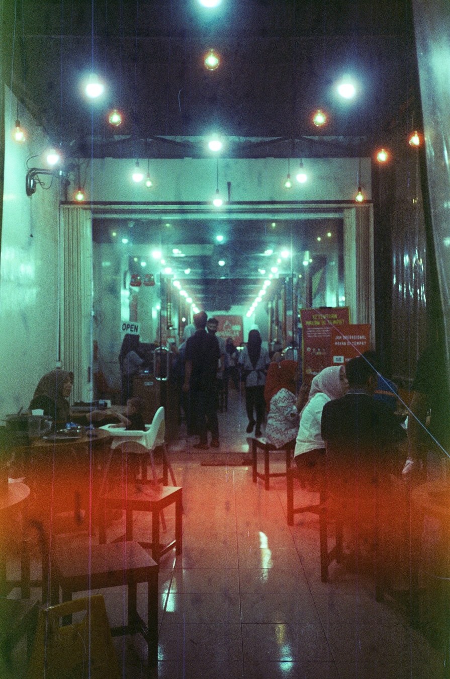 Cafe Interior at Night: Film Photography with Olympus XA-1. Shot with Olympus XA-1, Cira 800 film