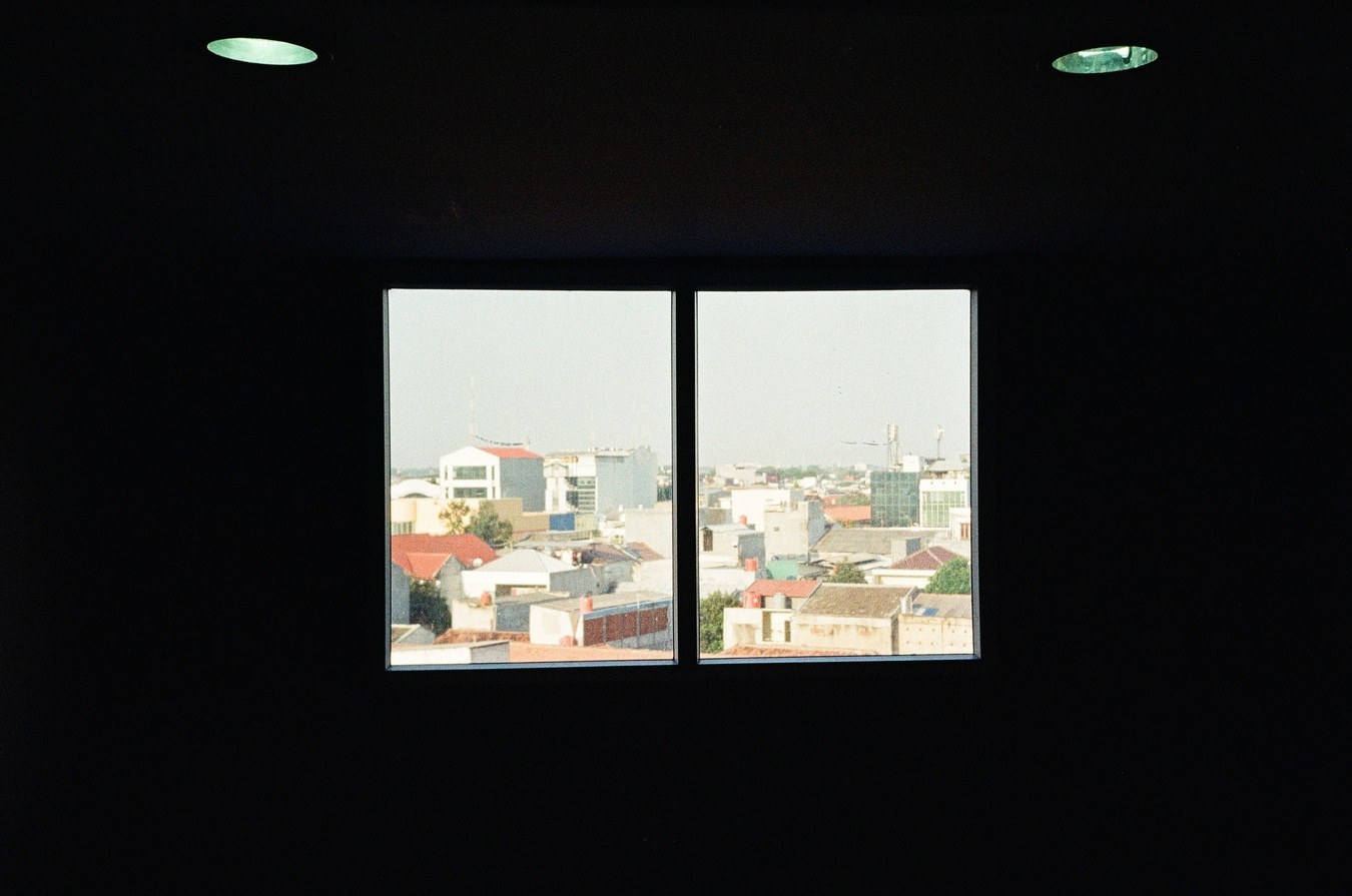 Cityscape Framed Through a Window. Shot with Olympus Mju II, Kodak Ultramax 400 film