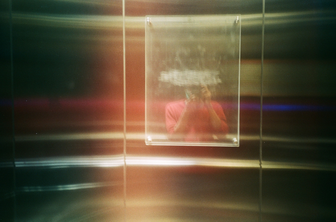 Blurred Reflection in Elevator Mirror