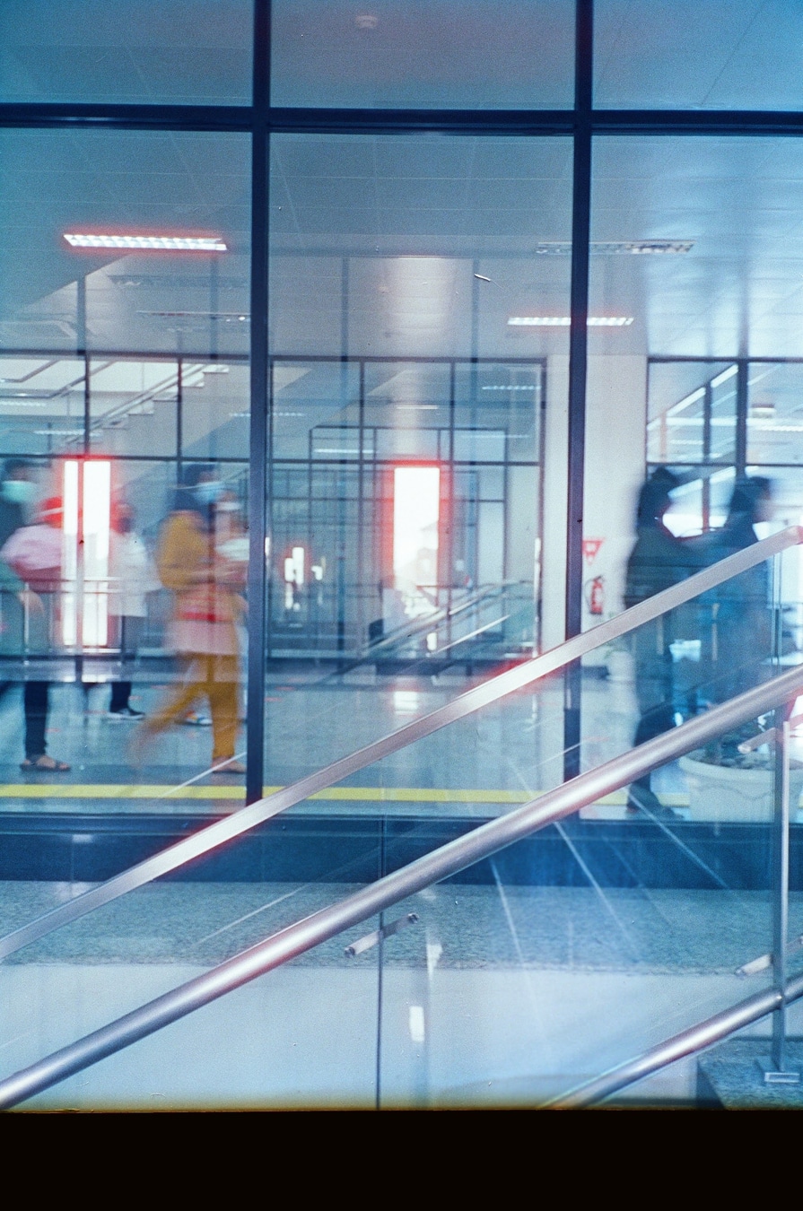 Glass Corridor Morning Commute